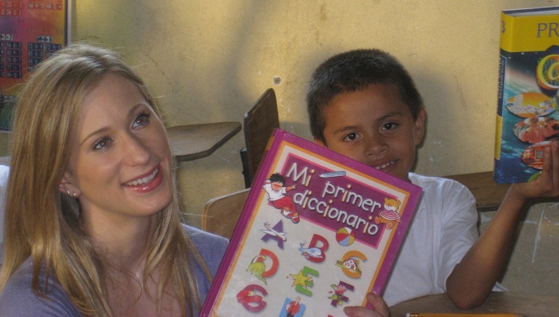 Joannie Rochette in Honduras with young World Vision friend